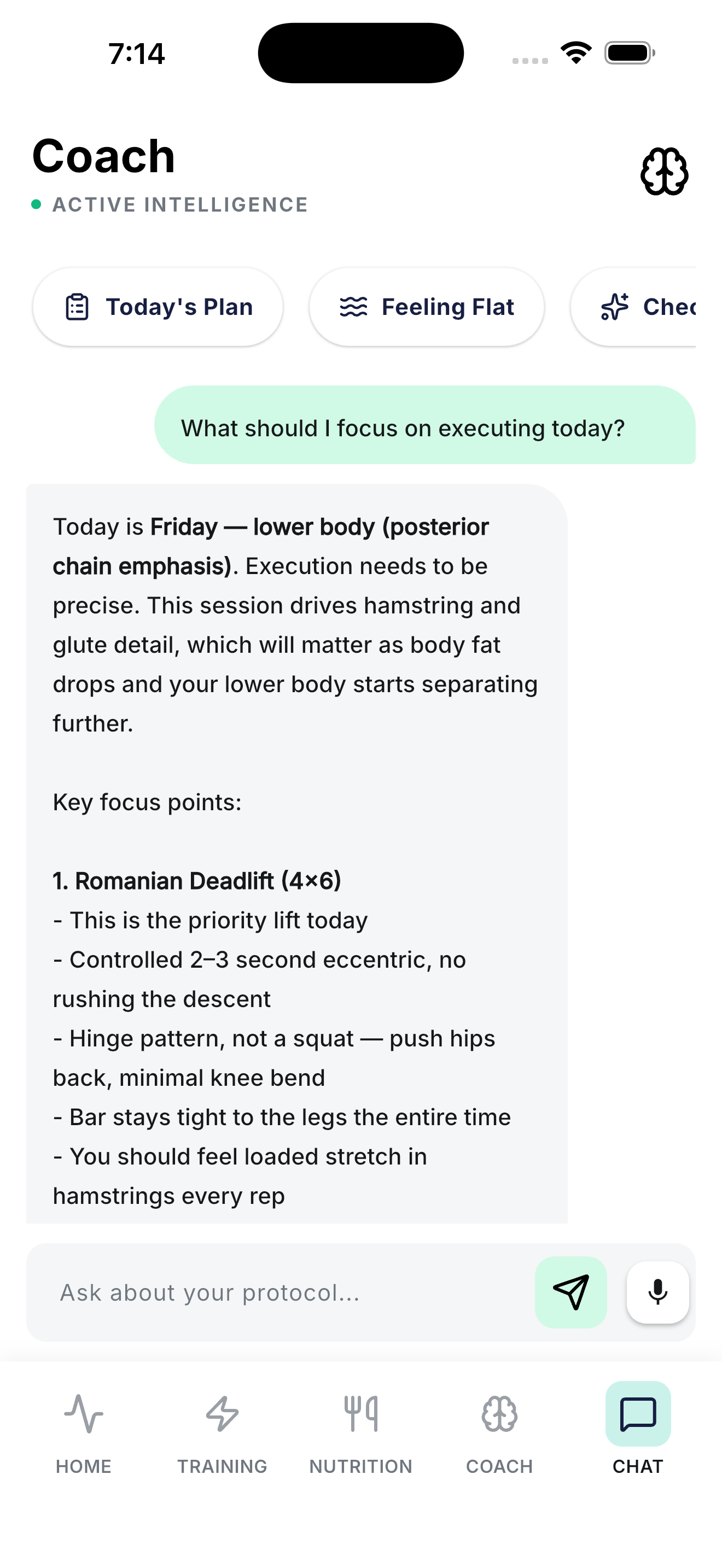 Coach chat screen with the AI coach's detailed answer about the day's training focus